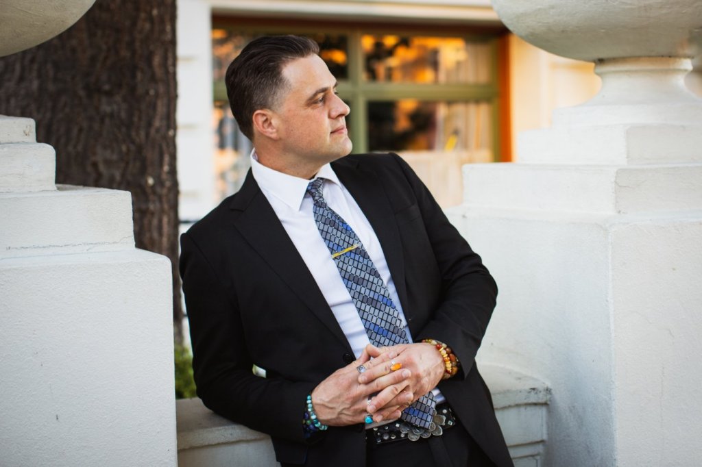 Steve Pinney Jr, life coach, in a dark suit